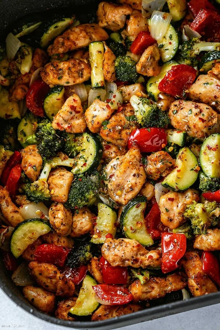 Healthy air fryer chicken with vegetables served in a bowl.