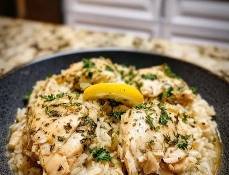 Delicious lemon herb chicken served with fluffy rice, perfect for family dinners.