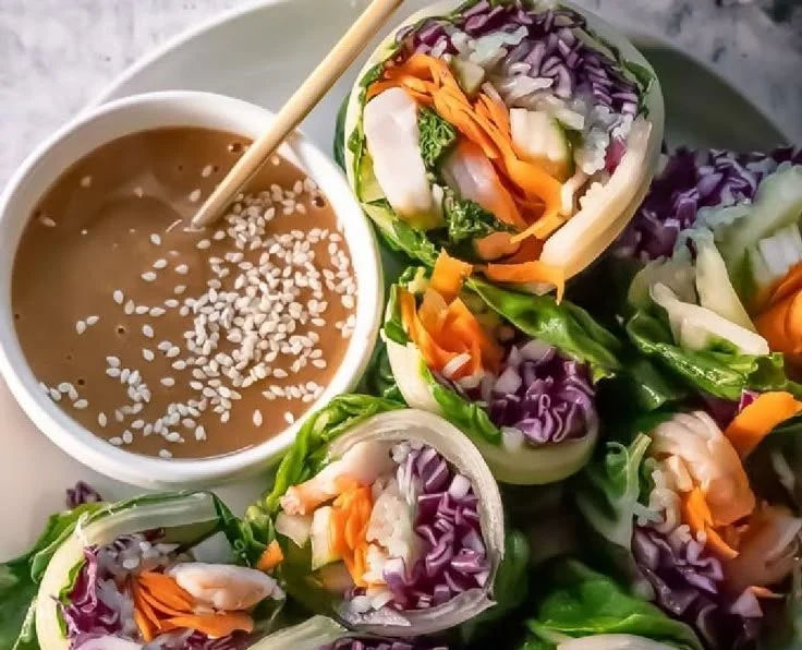Keto Spring Rolls served with rich peanut sauce for a healthy low-carb meal
