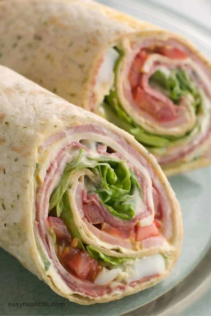 Low carb turkey roll-up served with fresh vegetables