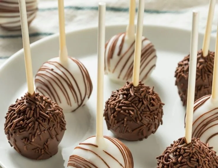 Low-sugar high protein cake pops stacked on a plate