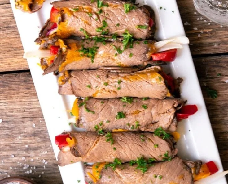 Delicious low carb roast beef roll ups filled with veggies and spices.