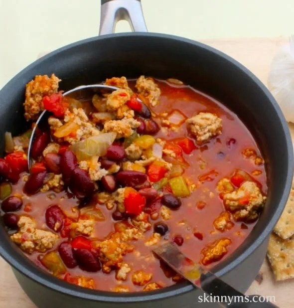 Bowl of spicy three bean turkey chili made in a slow cooker