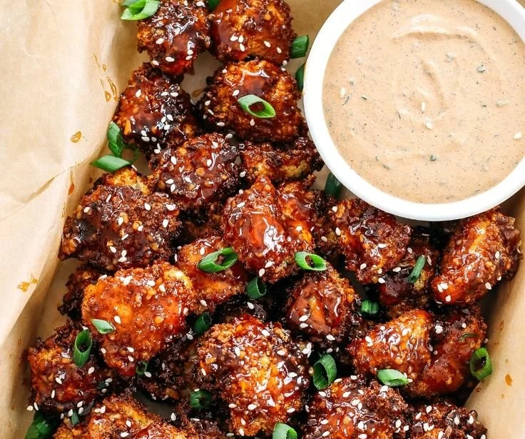 Delicious sticky honey garlic cauliflower wings served on a plate