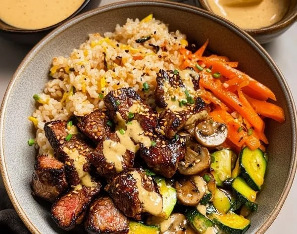Delicious Hibachi Steak Bowls served with vegetables and rice