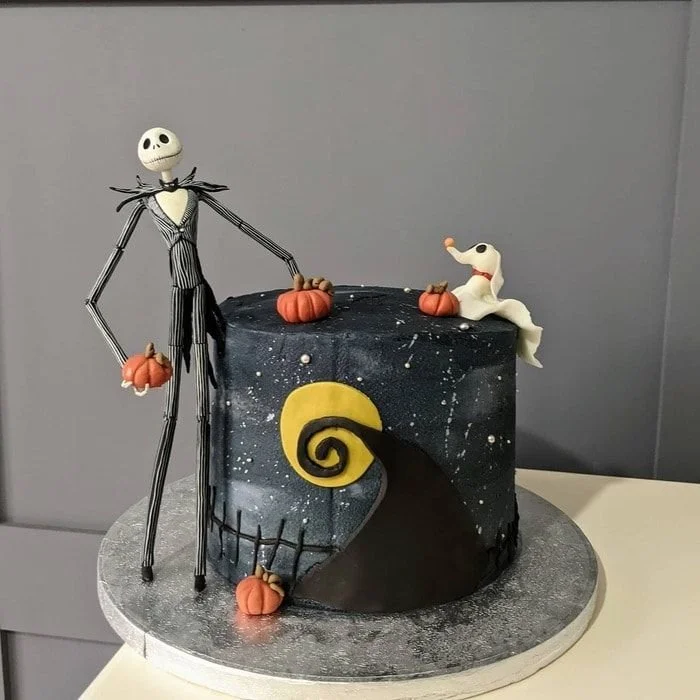 Spooky Tim Burton-themed cake with vibrant colors and intricate designs